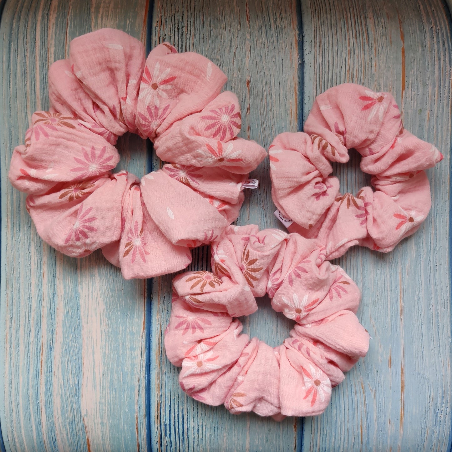 Pastel pink flower scrunchie