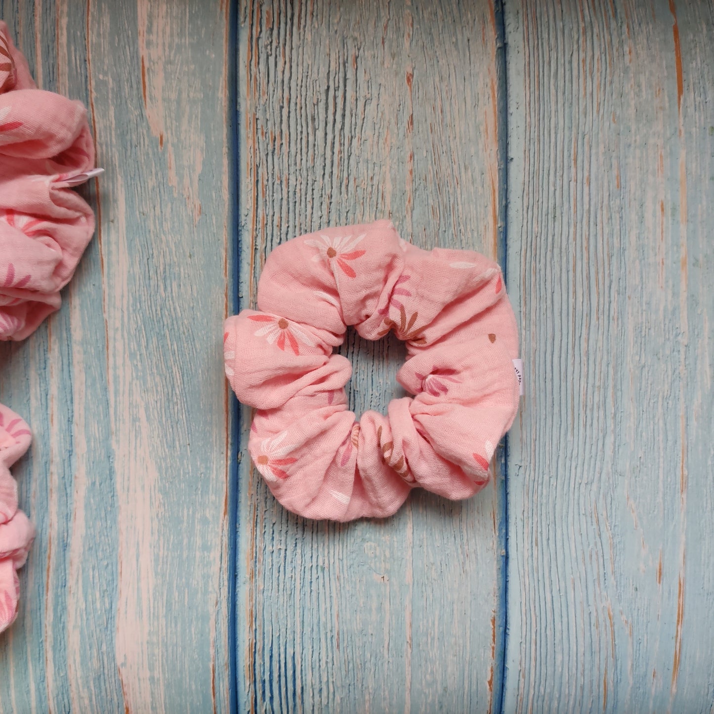 Pastel pink flower scrunchie