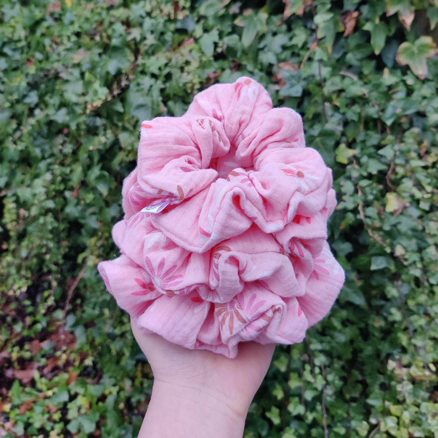 Pastel pink flower scrunchie