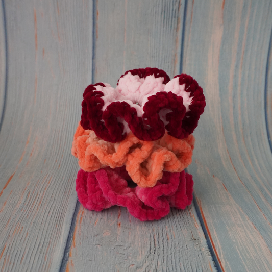 Pink, red and orange hues crochet scrunchies