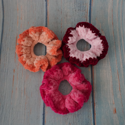 Pink, red and orange hues crochet scrunchies