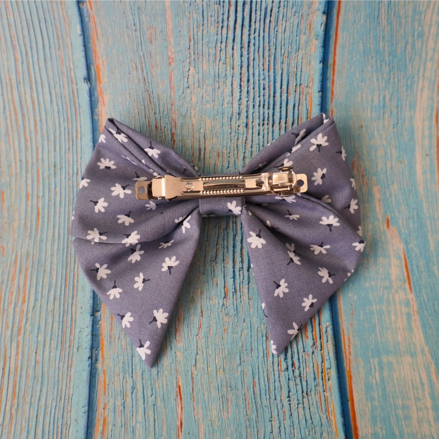 Grey bow with white small flowers