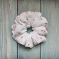 White scrunchie with pink hearts