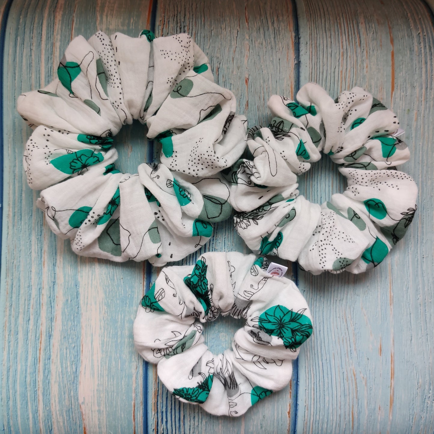 Feminine flowery scrunchie in green