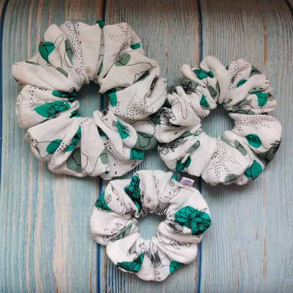 Feminine flowery scrunchie in green