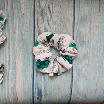 Feminine flowery scrunchie in green
