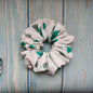 Feminine flowery scrunchie in green