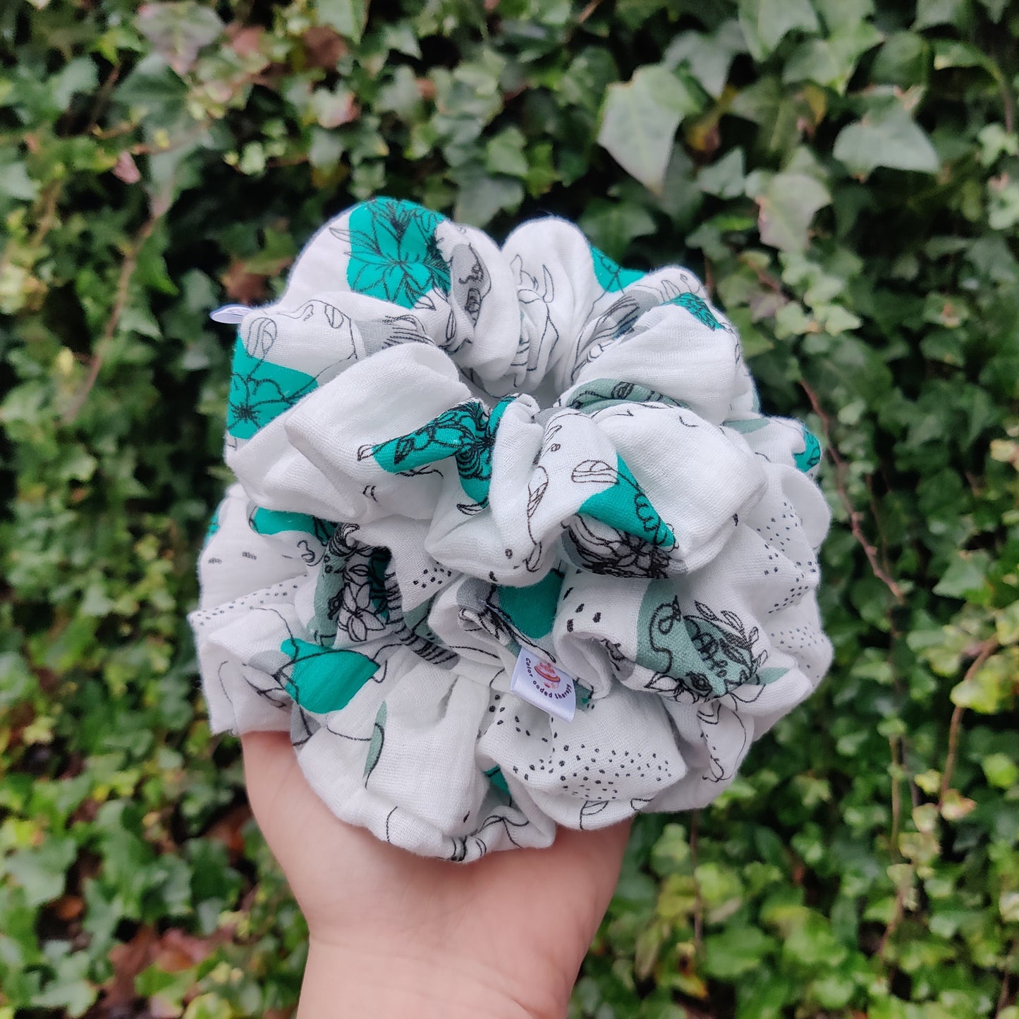 Feminine flowery scrunchie in green